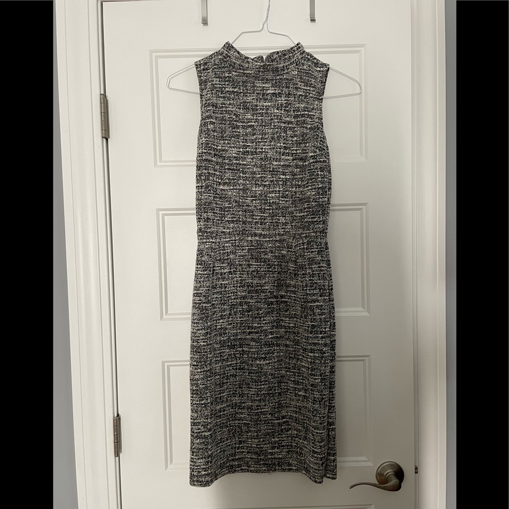 Black white and gold work dress. Tight fighting. Super cute